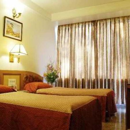Hotel Mandakini Ambience Πούνε Δωμάτιο φωτογραφία