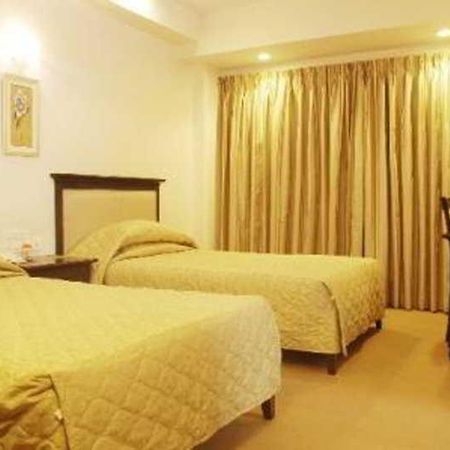 Hotel Mandakini Ambience Πούνε Δωμάτιο φωτογραφία
