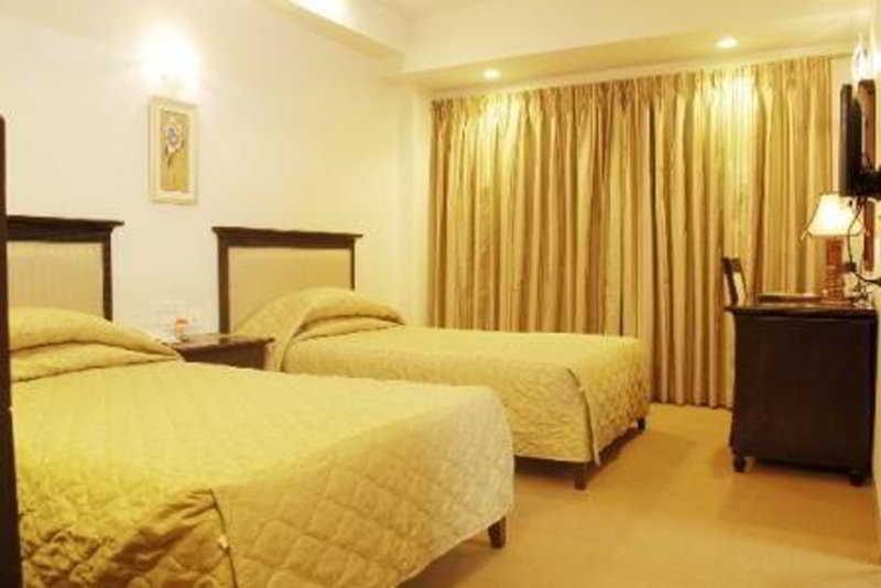 Hotel Mandakini Ambience Πούνε Δωμάτιο φωτογραφία